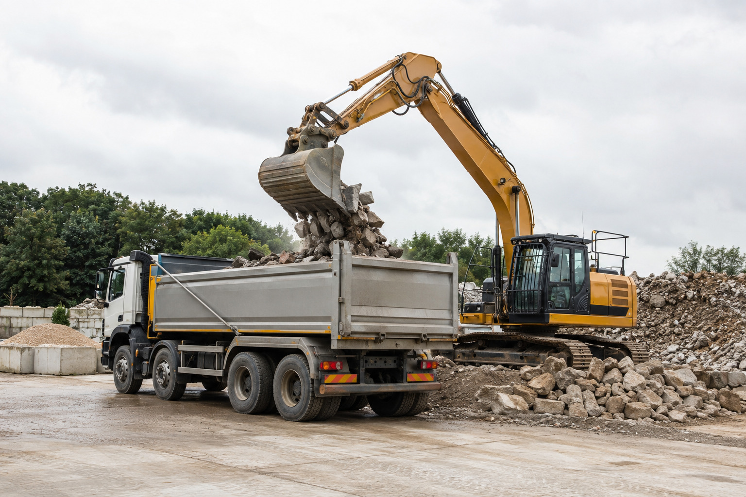 Excavator loading demolition material for removal