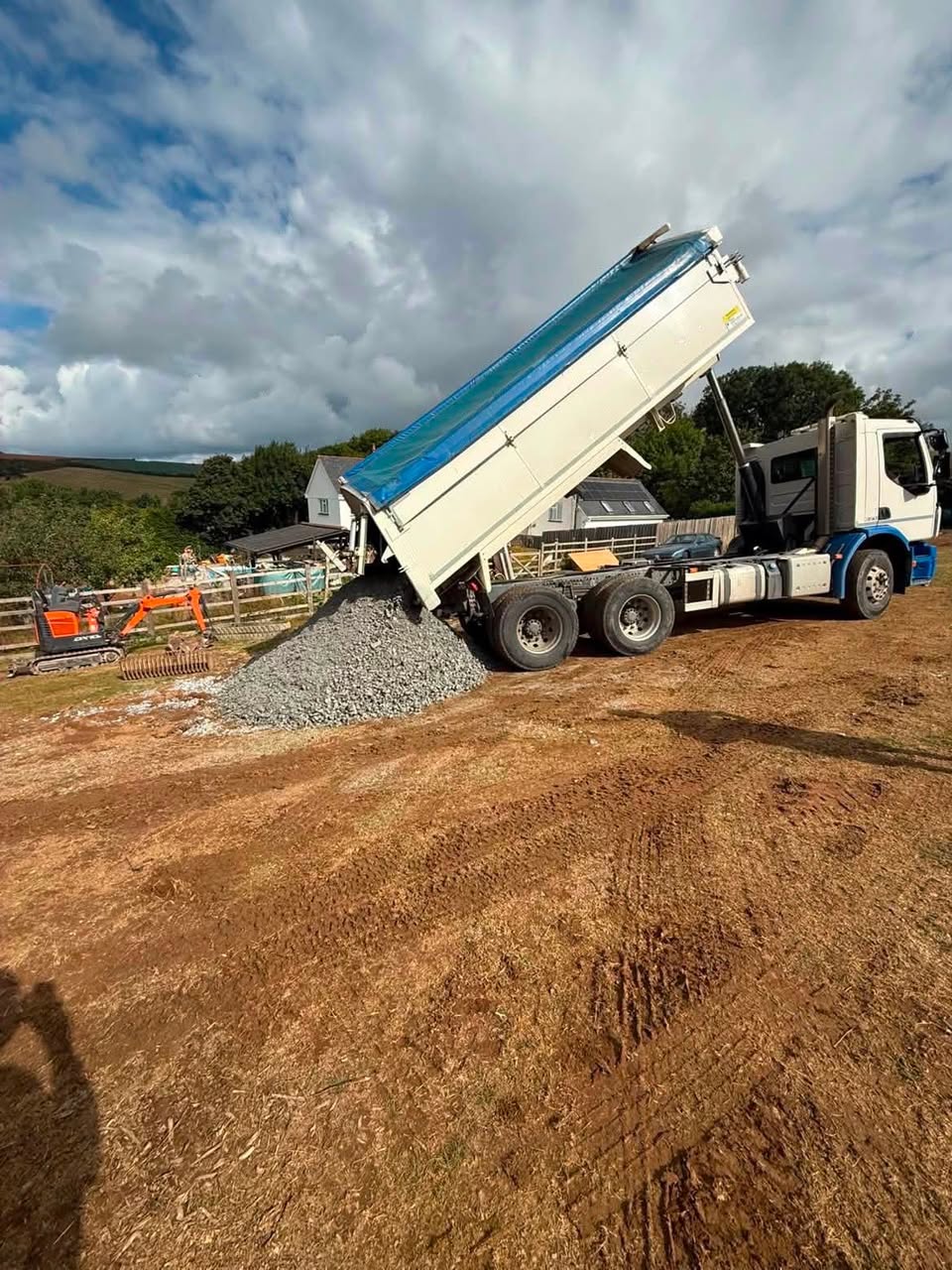 Aggregate delivery being tipped on a construction project in Cornwall